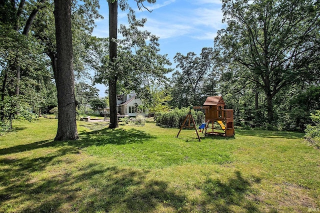 1730 Oak Park Dr, South Bend, IN 46617 - view of grassy yard featuring a playground