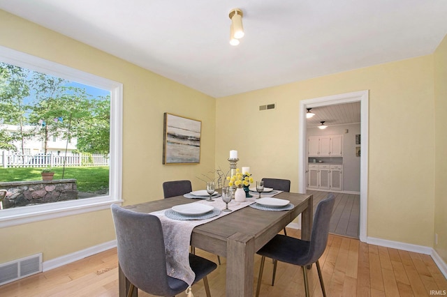1730 Oak Park Dr, South Bend, IN 46617 - dining space featuring light wood-style flooring and baseboards
