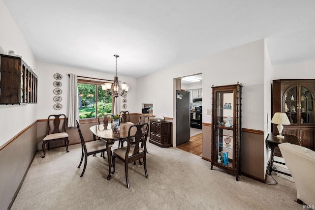 12199 Fields Farm Ct, Granger, IN 46530 - dining room with a chandelier and light colored carpet