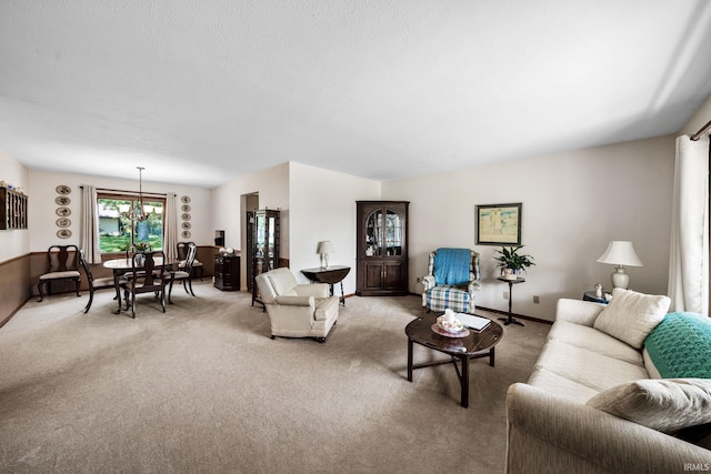 12199 Fields Farm Ct, Granger, IN 46530 - living area with light colored carpet and a chandelier