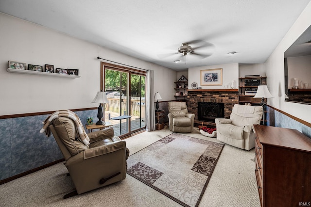 12199 Fields Farm Ct, Granger, IN 46530 - living room featuring carpet, ceiling fan, and a fireplace