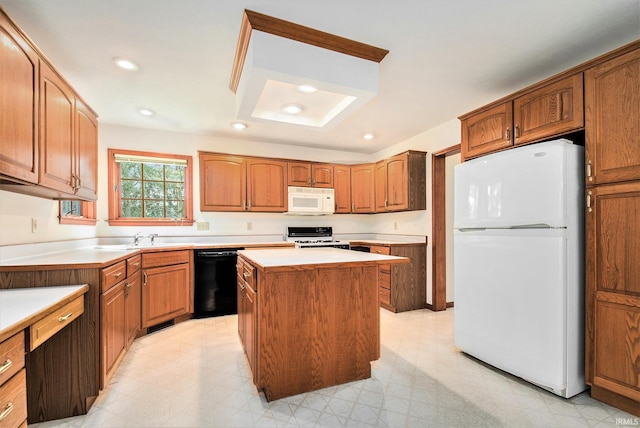 52206 Filbert Rd, Granger, IN 46530 - kitchen featuring white appliances, a center island, light countertops, light floors, and recessed lighting