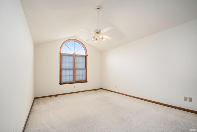52206 Filbert Rd, Granger, IN 46530 - spare room featuring lofted ceiling, light carpet, and ceiling fan