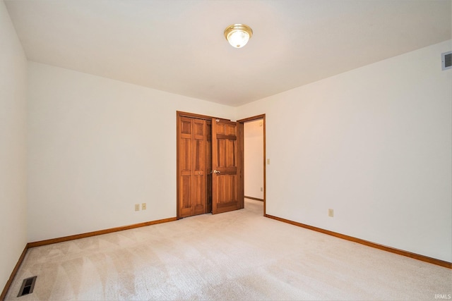 52206 Filbert Rd, Granger, IN 46530 - unfurnished bedroom featuring light colored carpet and a closet