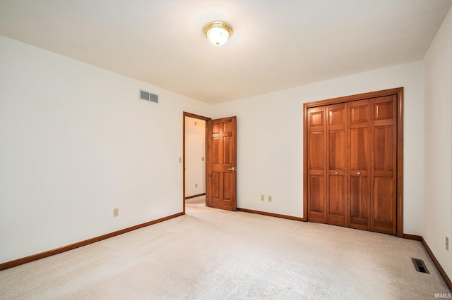 52206 Filbert Rd, Granger, IN 46530 - unfurnished bedroom with light colored carpet and a closet