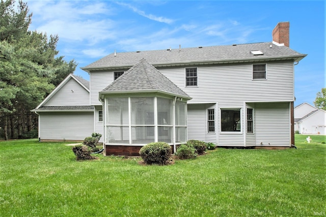 52206 Filbert Rd, Granger, IN 46530 - rear view of house with a chimney, roof with shingles, a lawn, and a sunroom