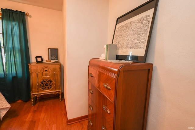 7420 S Fairfax Rd, Bloomington, IN 47401 - detailed view of wood finished floors and baseboards