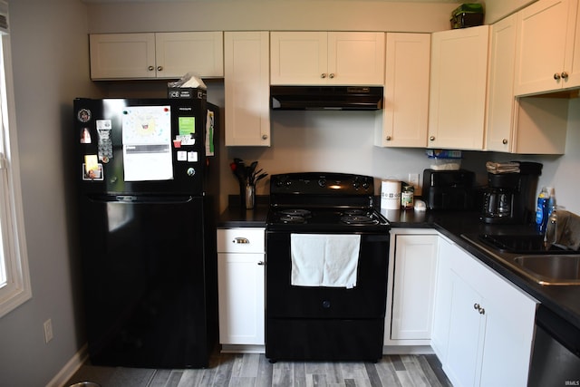 822 Aurora Knoll Ln, Fort Wayne, IN 46825 - kitchen featuring black appliances, exhaust hood, dark countertops, and white cabinetry