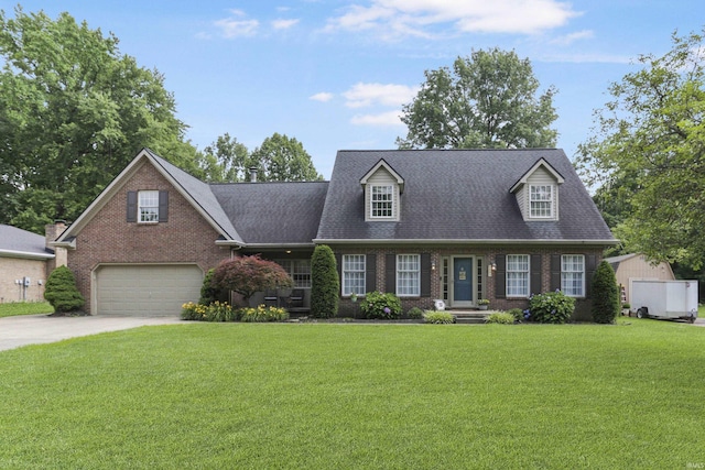 8855 Hickory Ln, Newburgh, IN 47630 - cape cod home with brick siding, concrete driveway, a front yard, and a garage