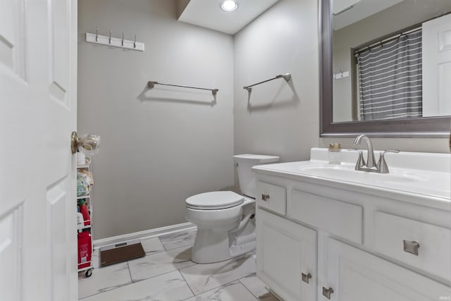 8855 Hickory Ln, Newburgh, IN 47630 - bathroom with marble finish floors, vanity, and recessed lighting