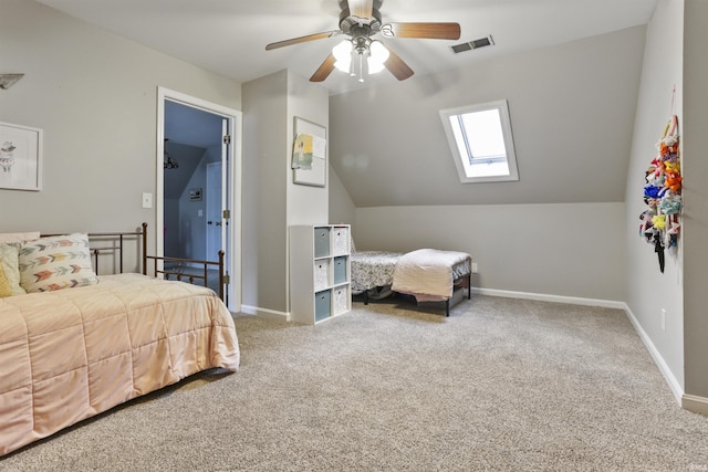 8855 Hickory Ln, Newburgh, IN 47630 - carpeted bedroom featuring a skylight, lofted ceiling, and a ceiling fan