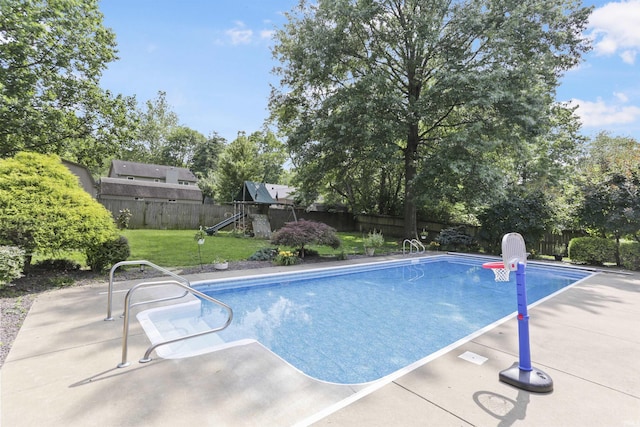 8855 Hickory Ln, Newburgh, IN 47630 - view of pool featuring a playground, a fenced backyard, and a patio area