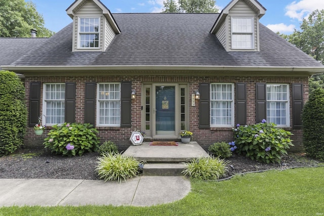 8855 Hickory Ln, Newburgh, IN 47630 - cape cod home with brick siding and roof with shingles