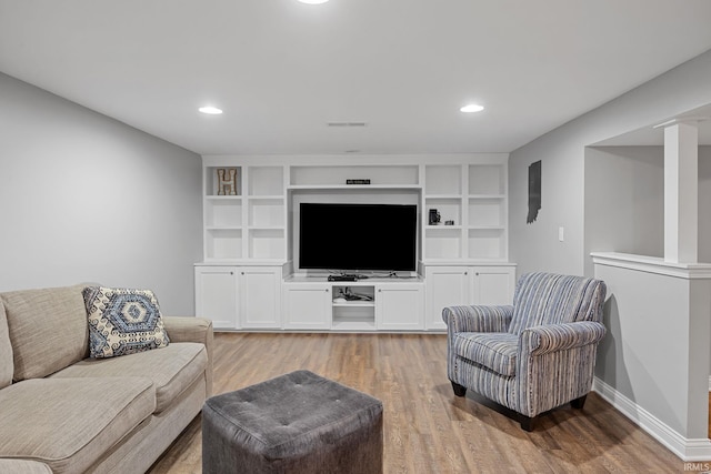 3726 Capilano Dr, West Lafayette, IN 47906 - living room featuring light wood-style flooring, built in shelves, and recessed lighting