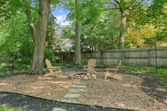 3726 Capilano Dr, West Lafayette, IN 47906 - fenced backyard featuring a fire pit