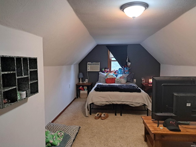 622 S Market St, Winamac, IN 46996 - carpeted bedroom featuring vaulted ceiling and a wall mounted AC