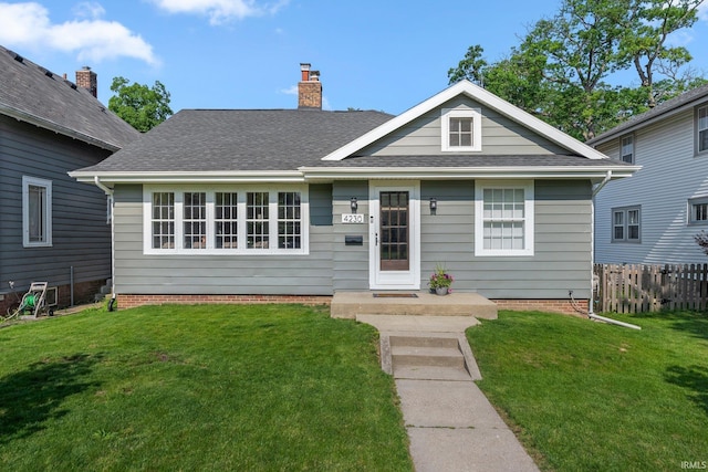 4230 Tacoma Ave, Fort Wayne, IN 46807 - view of front of home with a chimney and roof with shingles