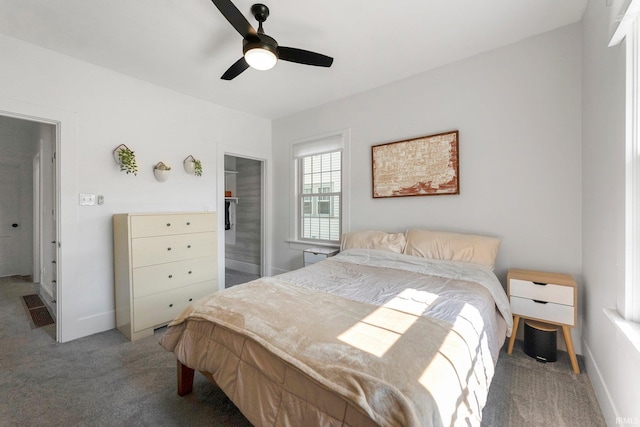 4230 Tacoma Ave, Fort Wayne, IN 46807 - bedroom with carpet floors, a spacious closet, a ceiling fan, and a closet