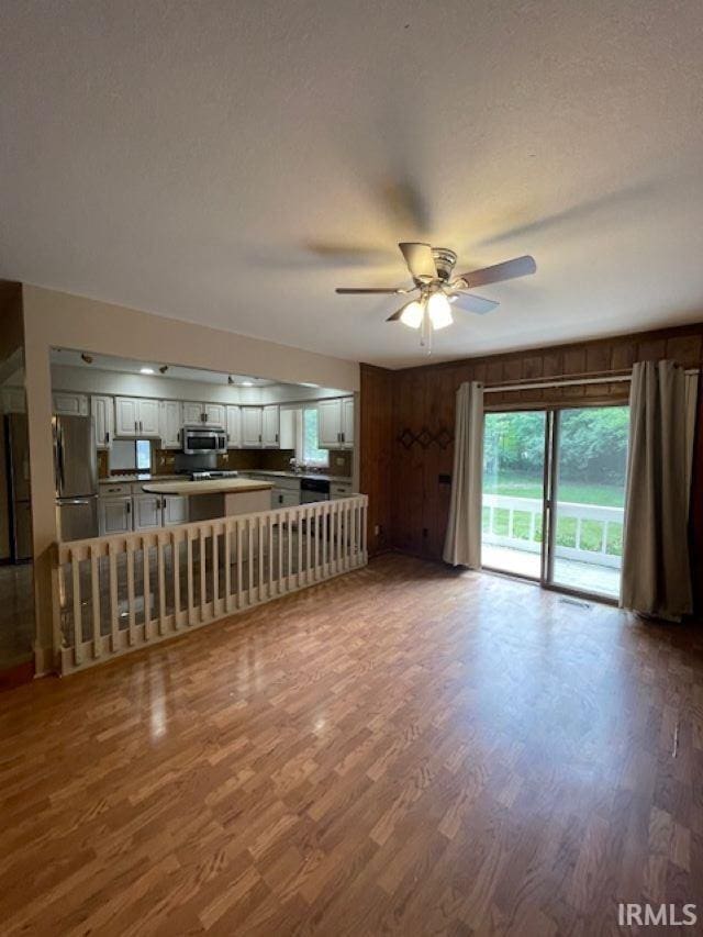 7030 Windshire Dr, Fort Wayne, IN 46814 - living area featuring wood finished floors and ceiling fan