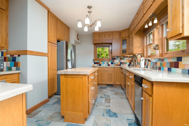 209 S 2nd St, Rockport, IN 47635 - kitchen featuring tasteful backsplash, stainless steel refrigerator with ice dispenser, a chandelier, a center island, and decorative light fixtures