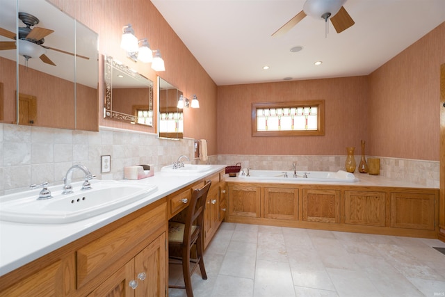 209 S 2nd St, Rockport, IN 47635 - full bathroom featuring a ceiling fan, double vanity, a bath, and backsplash