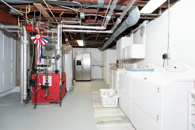 209 S 2nd St, Rockport, IN 47635 - unfinished basement with gas water heater, stainless steel fridge, washing machine and clothes dryer, and a heating unit