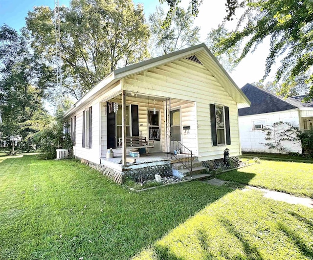 413 W 2nd St, Mount Carmel, IL 62863 - view of front of home with a front lawn and a porch