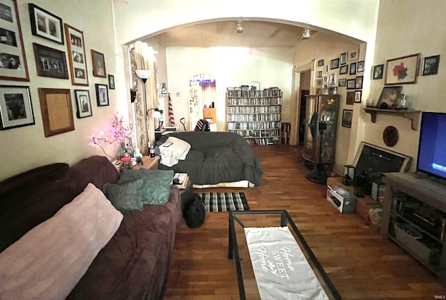 413 W 2nd St, Mount Carmel, IL 62863 - living area with arched walkways and wood finished floors