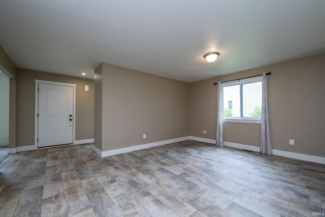305 Hill Top Ct, New Carlisle, IN 46552 - unfurnished room with wood finished floors and recessed lighting