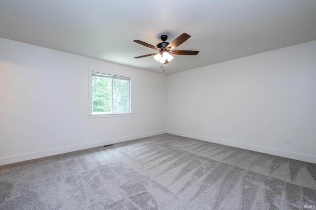 305 Hill Top Ct, New Carlisle, IN 46552 - empty room with carpet and ceiling fan