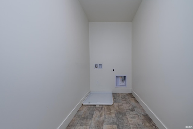 305 Hill Top Ct, New Carlisle, IN 46552 - laundry area featuring electric dryer hookup, washer hookup, and wood finished floors