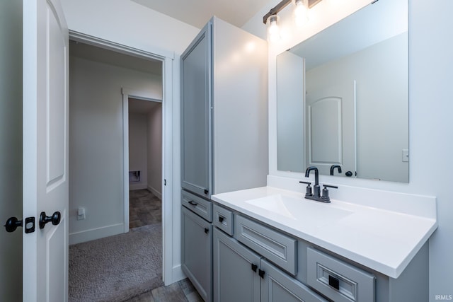 305 Hill Top Ct, New Carlisle, IN 46552 - bathroom with vanity and baseboards