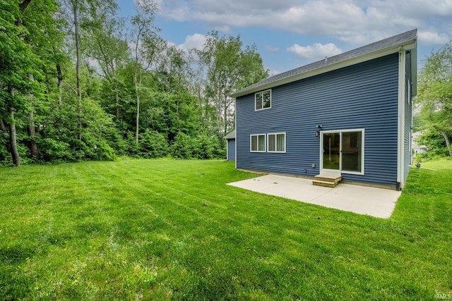 305 Hill Top Ct, New Carlisle, IN 46552 - rear view of house featuring a patio area and a yard