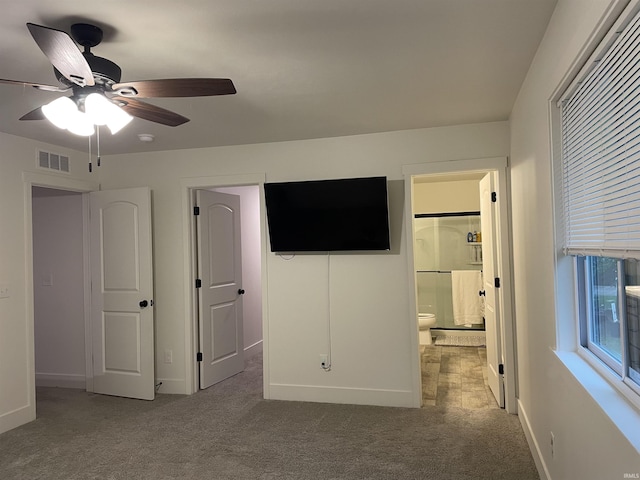 305 Hill Top Ct, New Carlisle, IN 46552 - unfurnished bedroom featuring carpet floors, ensuite bath, and ceiling fan