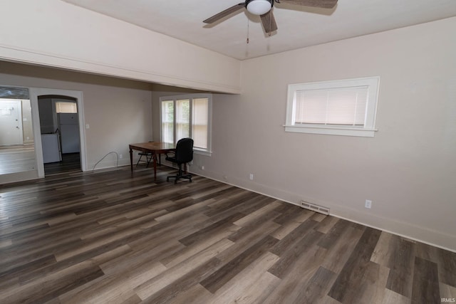 1722 Nash St, South Bend, IN 46613 - unfurnished office with a ceiling fan, dark wood finished floors, and arched walkways