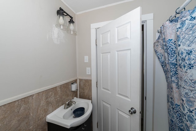1722 Nash St, South Bend, IN 46613 - full bathroom featuring tile walls, vanity, a wainscoted wall, crown molding, and a shower with curtain