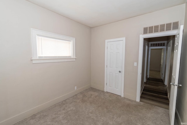 1722 Nash St, South Bend, IN 46613 - unfurnished bedroom featuring carpet and baseboards