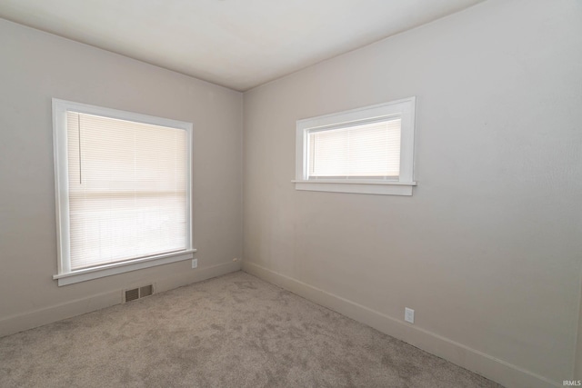 1722 Nash St, South Bend, IN 46613 - carpeted empty room featuring healthy amount of natural light