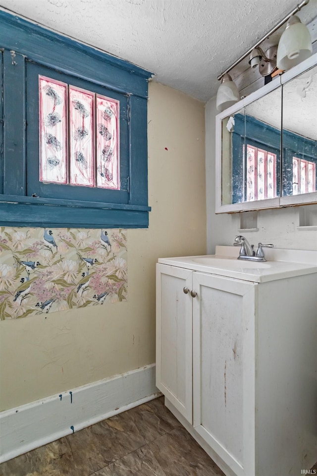 906 S Union St, Kokomo, IN 46901 - bathroom with a textured ceiling and vanity