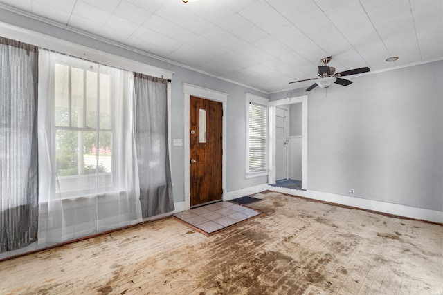 906 S Union St, Kokomo, IN 46901 - entrance foyer with crown molding, healthy amount of natural light, a ceiling fan, and wood finished floors
