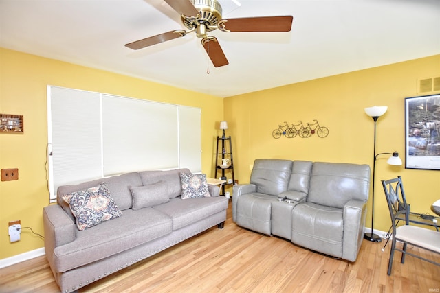 2885 E Bradford Ct, Monon, IN 47959 - living room featuring light wood-style floors and a ceiling fan