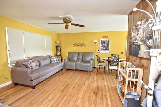 2885 E Bradford Ct, Monon, IN 47959 - living area with light wood finished floors and a ceiling fan