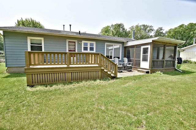2885 E Bradford Ct, Monon, IN 47959 - back of house with a wooden deck, a sunroom, and a lawn