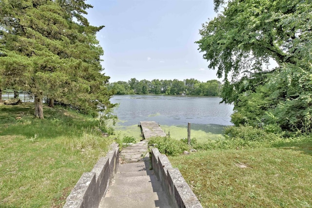 2885 E Bradford Ct, Monon, IN 47959 - water view featuring a dock and a heavily wooded area