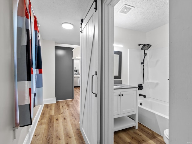 2015 E Blackford Ave, Evansville, IN 47714 - hall with light wood finished floors and a textured ceiling