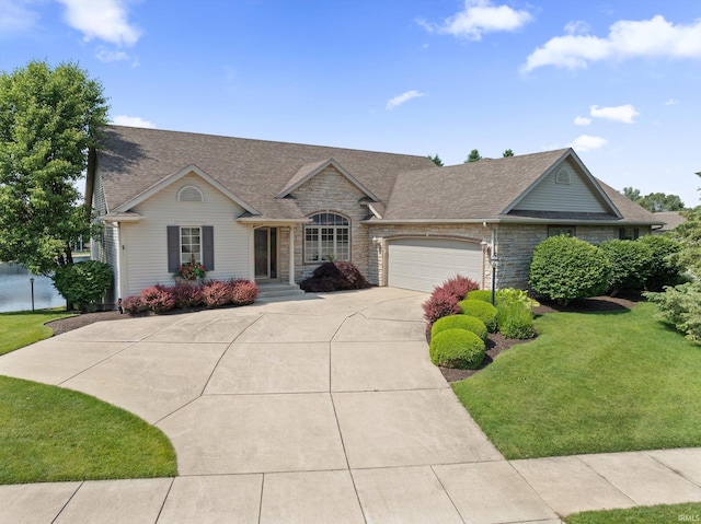 6615 Leeway Dr, South Bend, IN 46628 - view of front of property with stone siding, driveway, a garage, a front lawn, and a shingled roof