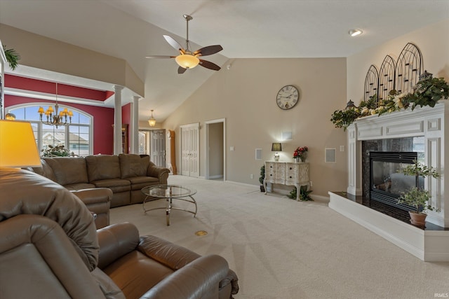 6615 Leeway Dr, South Bend, IN 46628 - living room featuring carpet, a high end fireplace, ceiling fan, high vaulted ceiling, and ornate columns