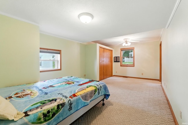 1385 S 460 E, Lagrange, IN 46761 - bedroom featuring crown molding, a closet, light colored carpet, and a ceiling fan