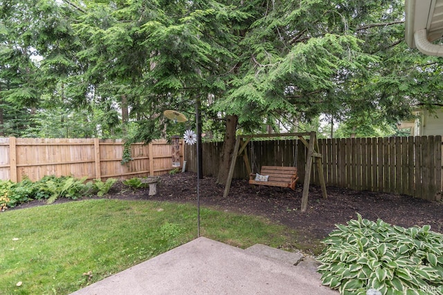 4525 W Middle Ct, Bloomington, IN 47403 - fenced backyard featuring a patio