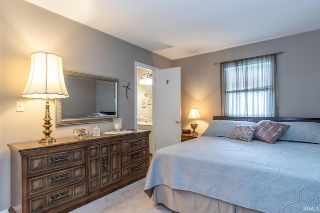4525 W Middle Ct, Bloomington, IN 47403 - carpeted bedroom with ensuite bathroom